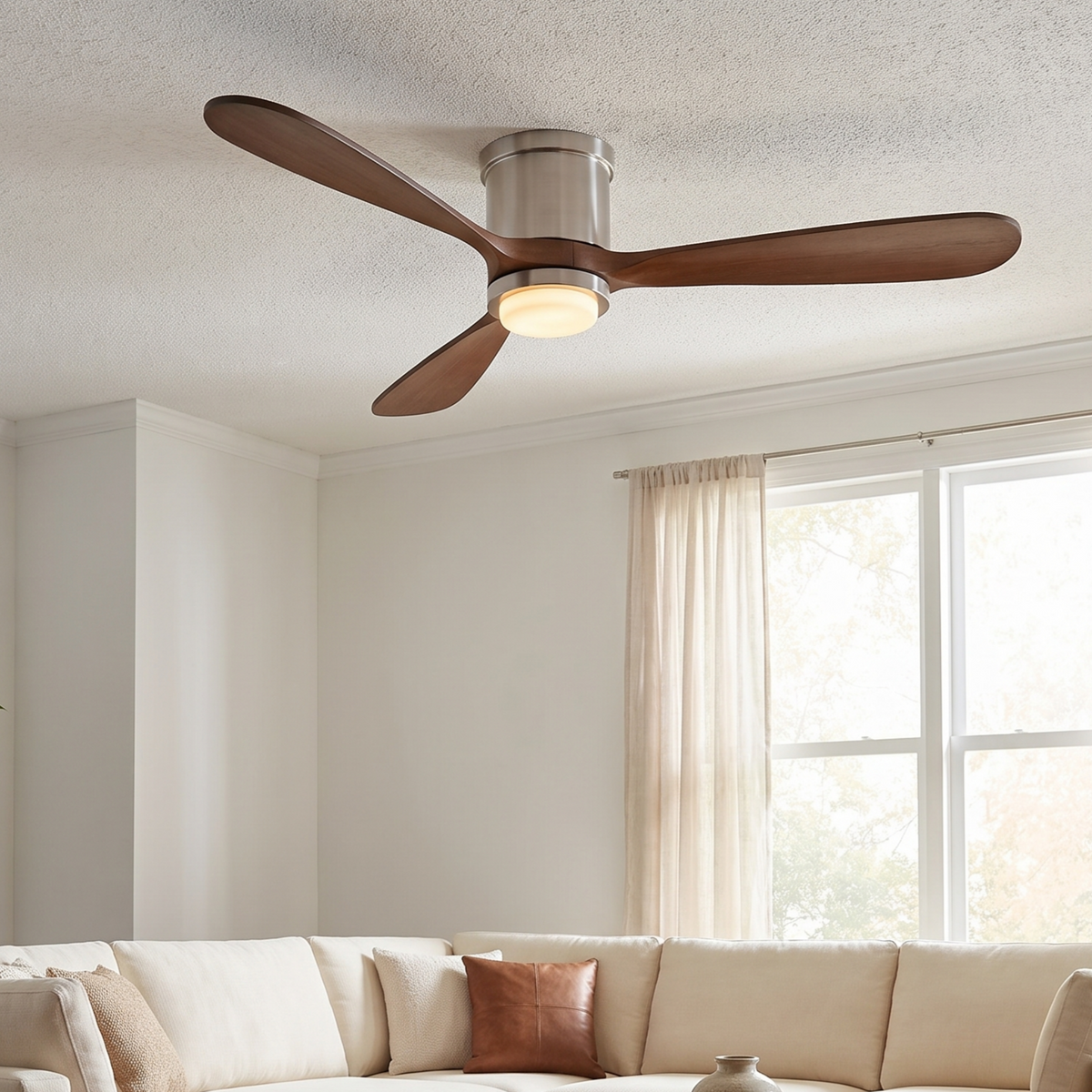 Modern ceiling fan with three dark wood blades and an integrated light fixture.